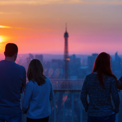 People admiring Paris and Eiffel Tower from Montparnasse Tower a
